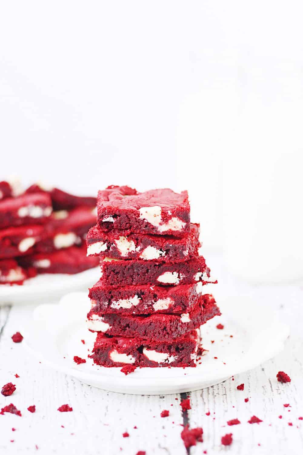 Red Velvet Cake Mix Bars -- Red velvet cake mix bars require only five ingredients and five minutes to throw together. They're soft, chewy and all kinds of white chocolatey Perfect for Valentine's Day! | halfscratched.com #redvelvet #recipe #cookies