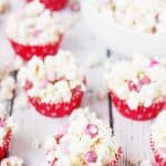 3-Ingredient Valentine's Popcorn Balls -- Valentine's popcorn balls are a super fun treat to serve at your Valentine's parties. With only three ingredients, they're super quick and easy to make! | halfscratched.com #valentinesday #recipe #popcorn
