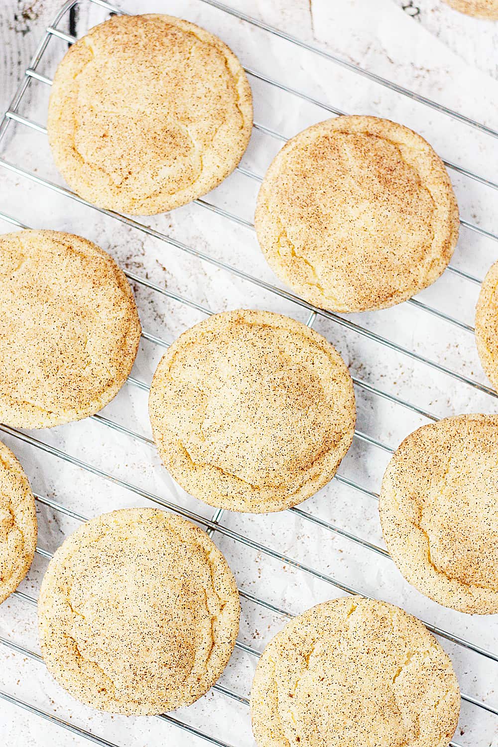 Best Ever Snickerdoodle Recipe -- I'm not lying when I say these this is the best ever snickerdoodle recipe. Soft and chewy on the inside, slightly crisp on the edges and packed with cinnamon sugar flavor. | halfscratched.com