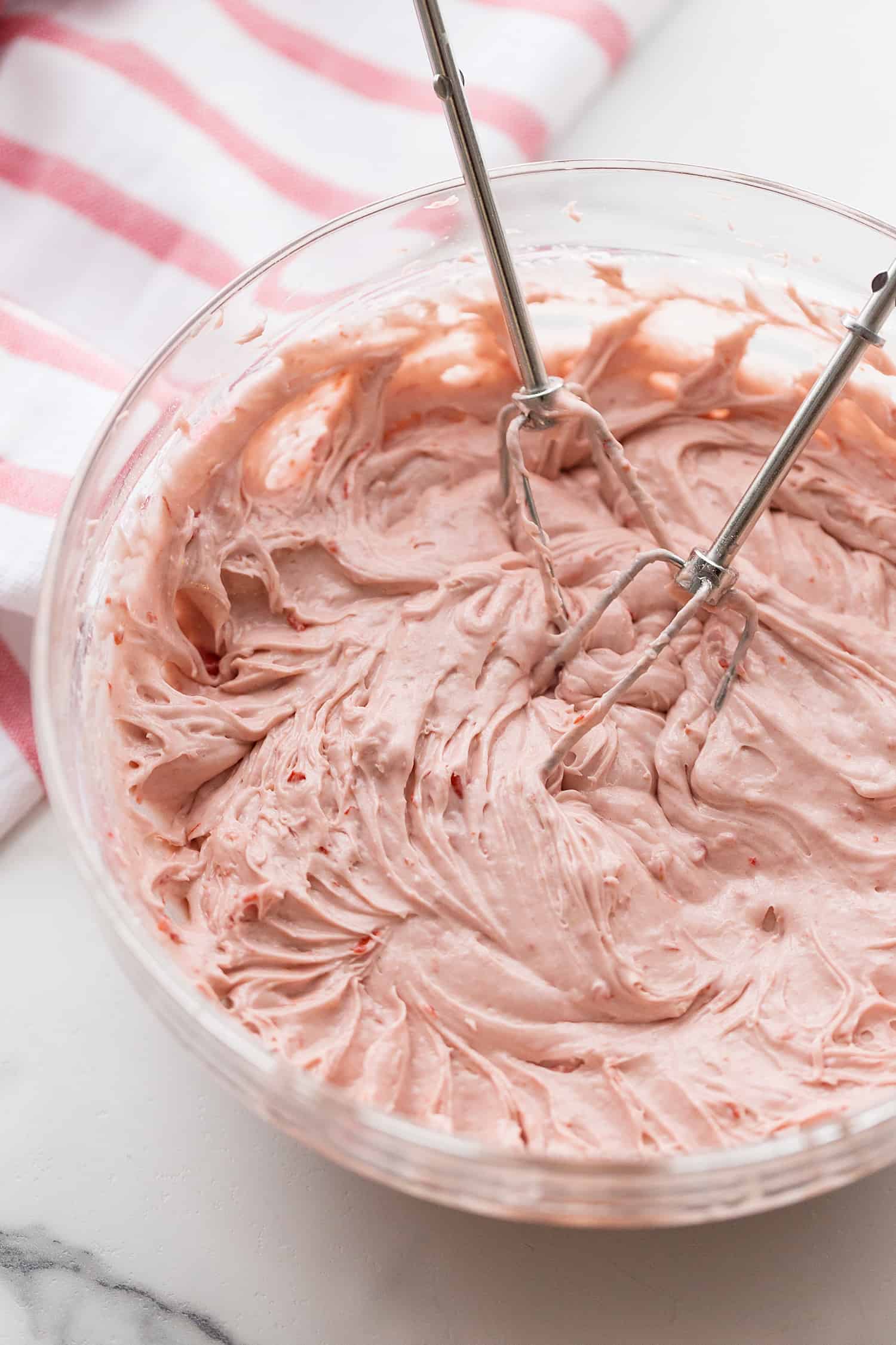 Easy Cherry Cake - Easy cherry cake with whipped topping is unbelievably delicious and requires only a white cake mix, cherry pie filling, and a few other ingredients. Whipped topping frosting is the finishing touch! #cherry #cherrycake #cakemix #cake #baking #sweets #dessert #halfscratched