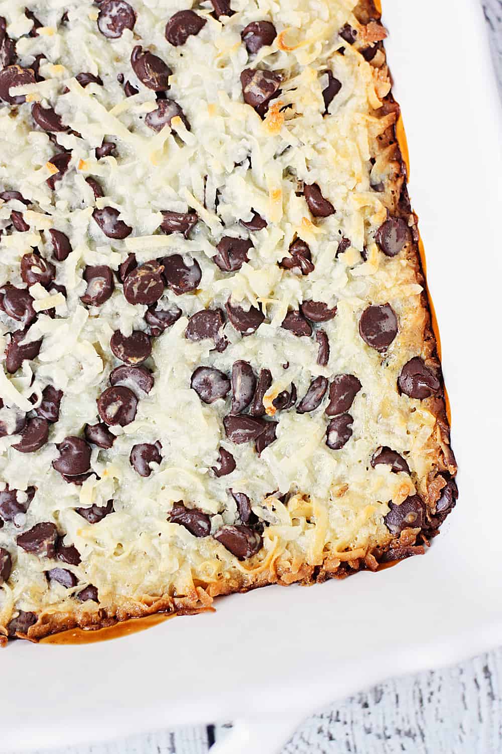 One-Pan Hello Dolly Bars -- This recipe for Hello Dolly bars calls for six simple ingredients, one pan and about 10 minutes to prep. The result is a bar cookie that is soft, chewy and highly addictive! | halfscratched.com #recipe #dessert