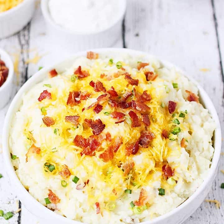 Instant Pot Mashed Potatoes with Cheddar Bacon and Onion -- Instant Pot mashed potatoes with cheddar, bacon and onion are my new favorite side dish. They're creamy, packed with delicious flavors, and an ideal Instant Pot recipe for newbies! | halfscratched.com #halfscratched #instantpot #pressurecooker #recipe