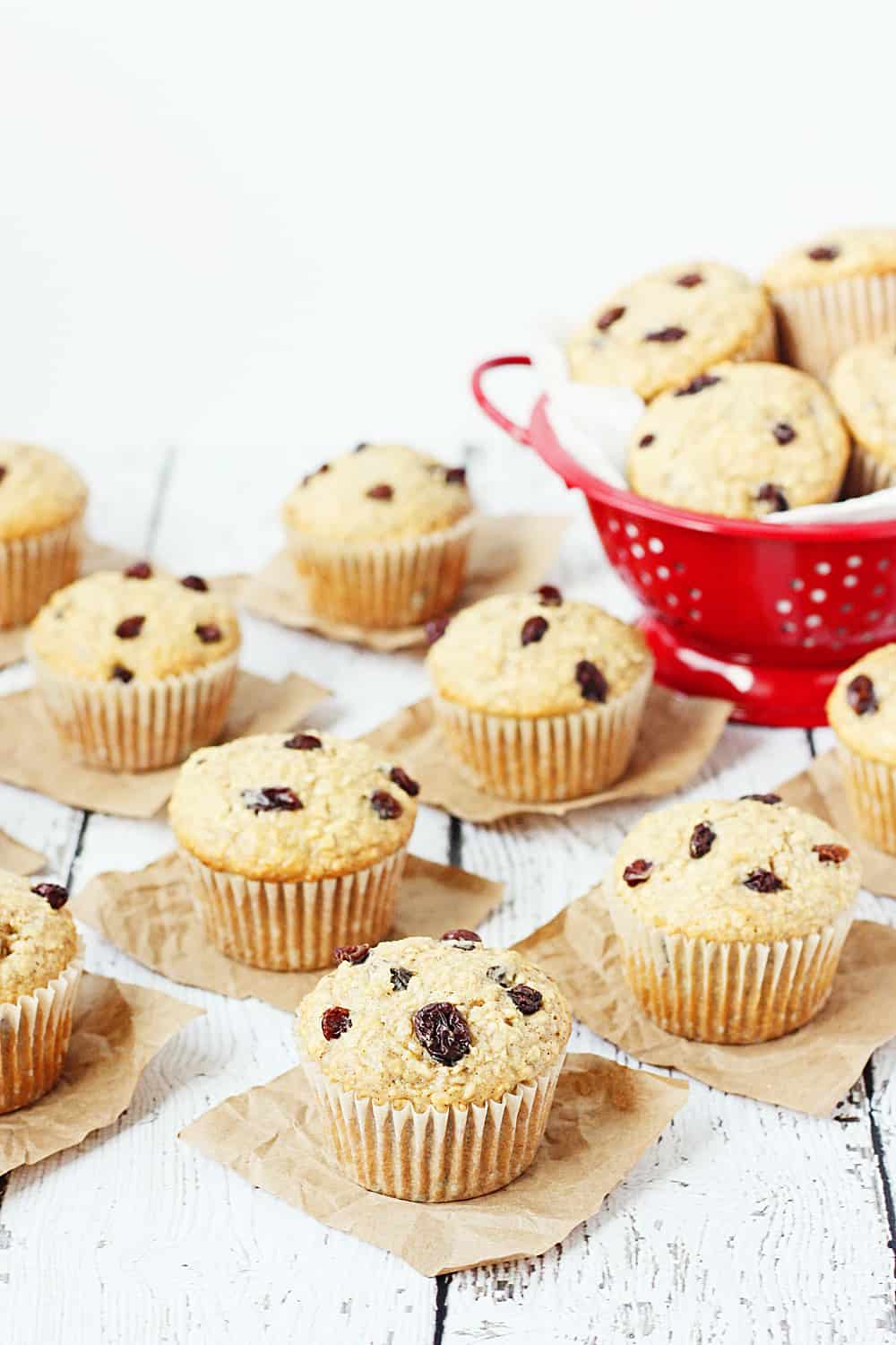 Oatmeal Raisin Cake Mix Muffins -- Bake a batch of these oatmeal raisin cake mix muffins and see if your family doesn't eat them in record time. Don't like raisins? Try mini chocolate chips or craisins instead! | halfscratched.com #recipe #breakfast