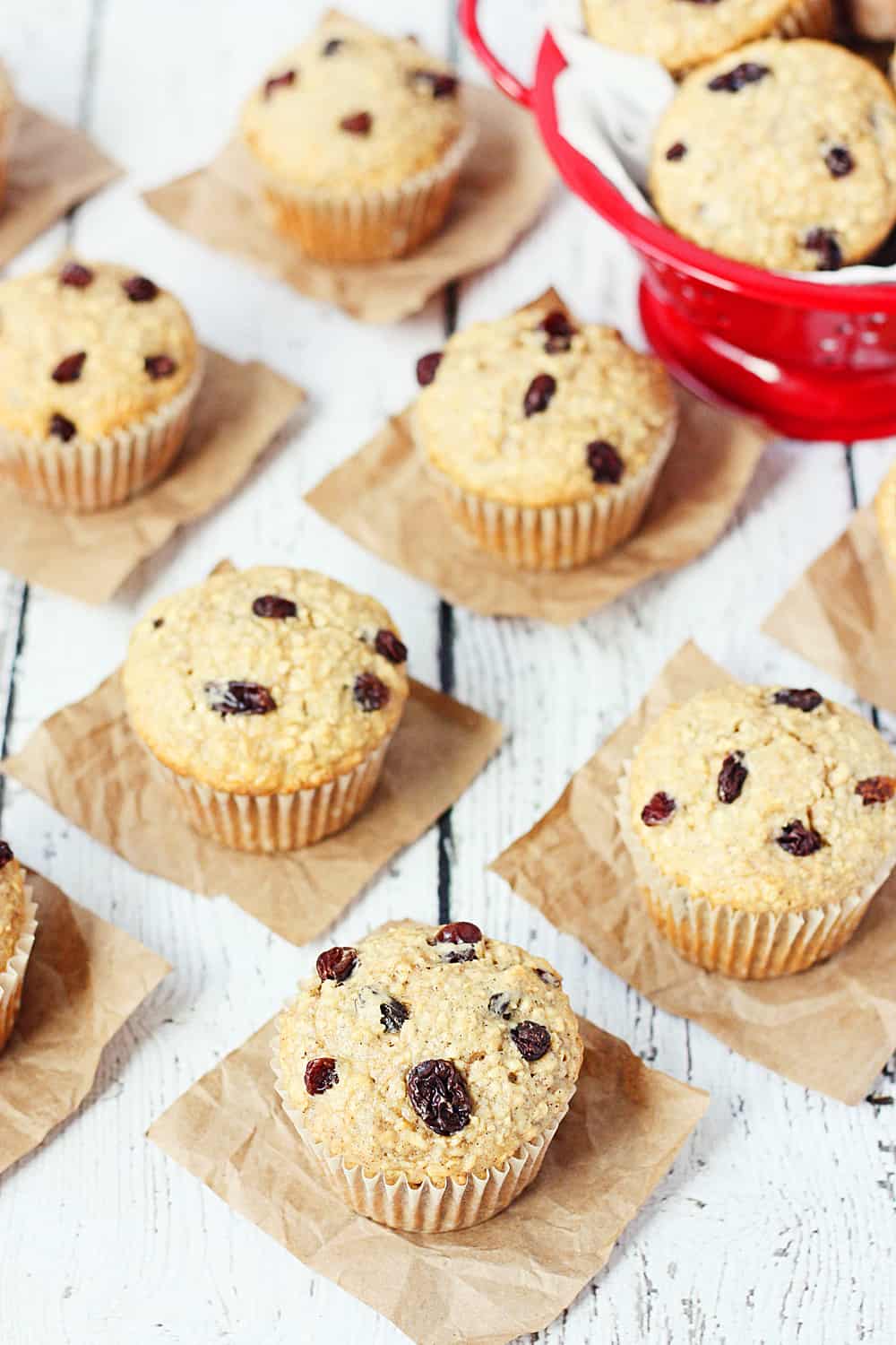 Oatmeal Raisin Cake Mix Muffins -- Bake a batch of these oatmeal raisin cake mix muffins and see if your family doesn't eat them in record time. Don't like raisins? Try mini chocolate chips or craisins instead! | halfscratched.com #recipe #breakfast