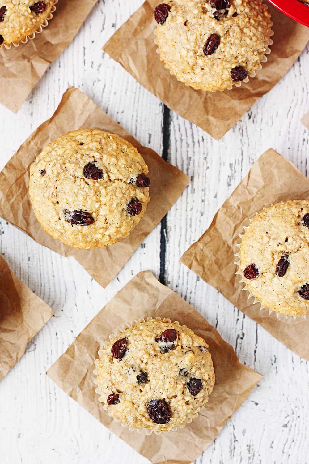 Oatmeal Raisin Cake Mix Muffins -- Bake a batch of these oatmeal raisin cake mix muffins and see if your family doesn't eat them in record time. Don't like raisins? Try mini chocolate chips or craisins instead! | halfscratched.com #recipe #breakfast