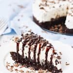 Easy Chocolate Chip Brownie Cheesecake -- Make this easy chocolate chip brownie cheesecake at your next party and you'll be the favorite. Brownie mix plus a simple cheesecake topping come together for a truly delightful dessert! | halfscratched.com