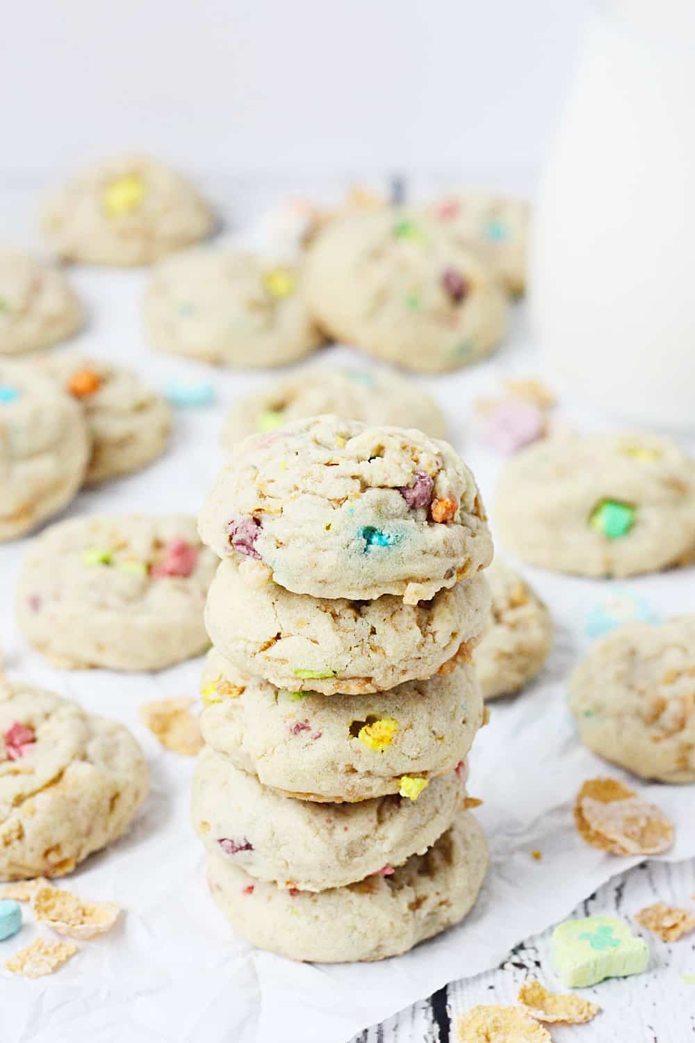 Lucky Charms Frosted Flakes Cookies --Lucky Charms Frosted Flakes cookies are soft and chewy with a hint of crunch and a smattering of sweet thanks to those crispy flakes and colorful marshmallows. | halfscratched.com