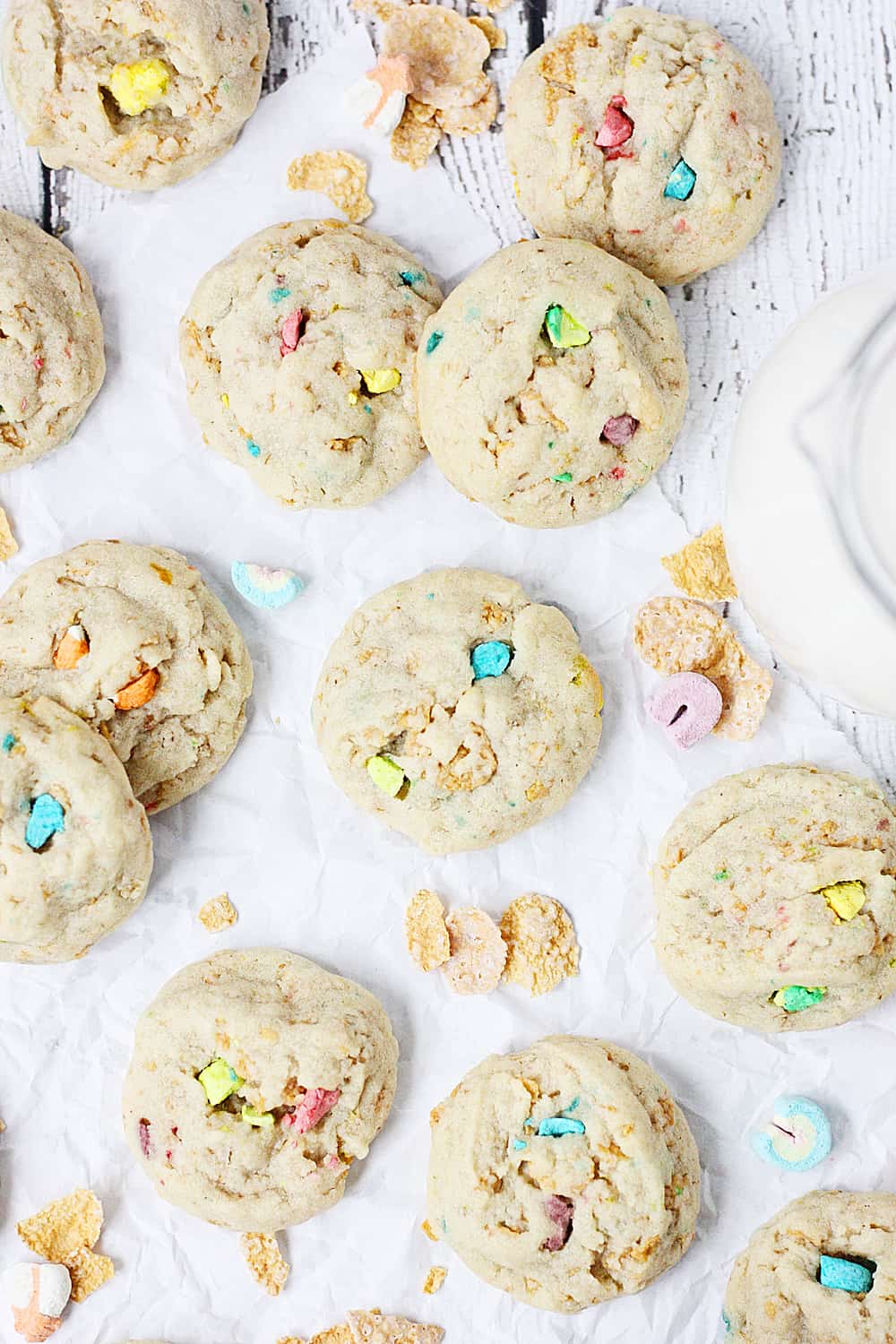 Lucky Charms Frosted Flakes Cookies --Lucky Charms Frosted Flakes cookies are soft and chewy with a hint of crunch and a smattering of sweet thanks to those crispy flakes and colorful marshmallows. | halfscratched.com