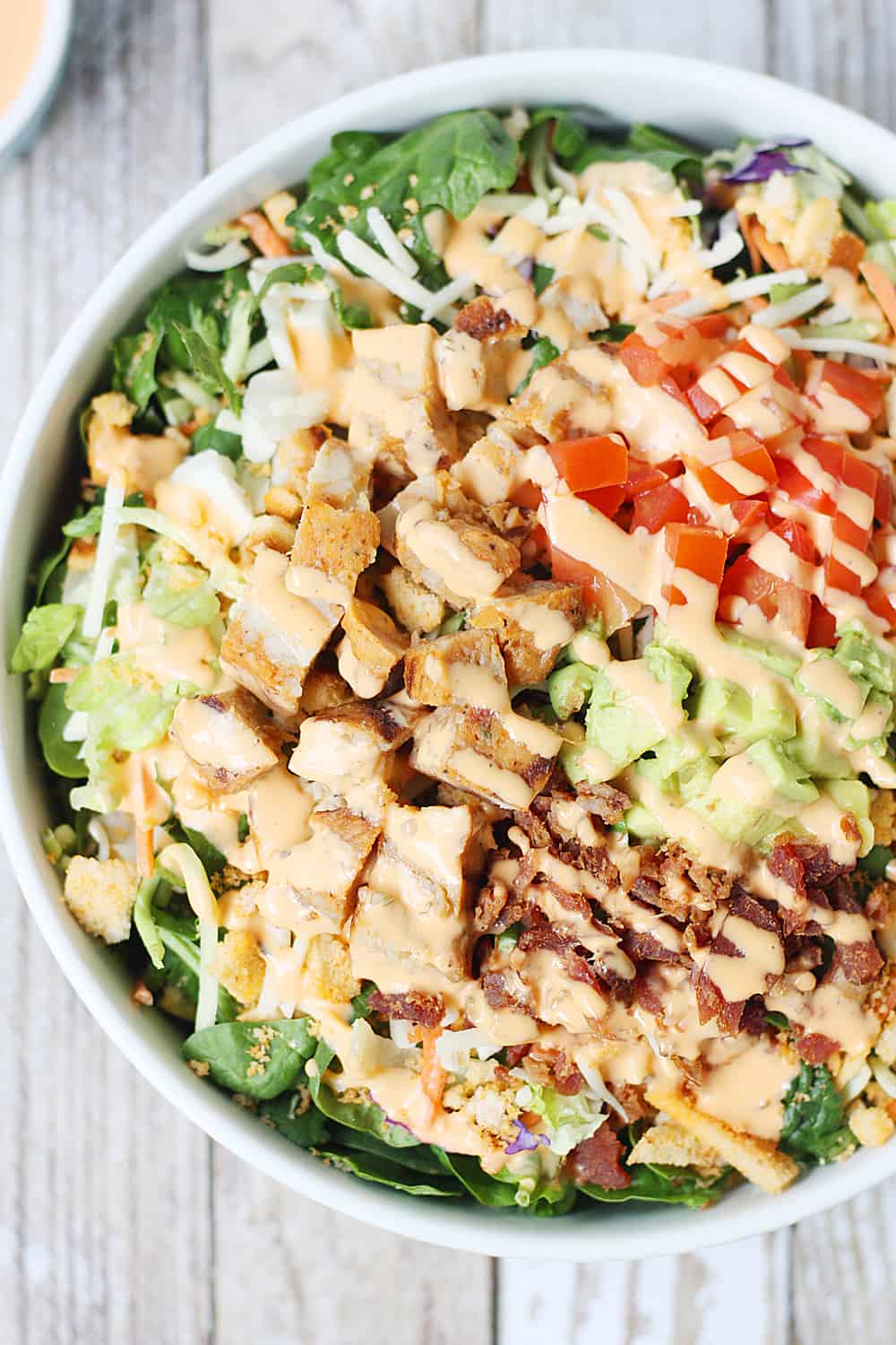 5-Minute Southwest BLT Chicken Salad -- This 5-minute southwest BLT chicken salad makes for an easy weeknight recipe. It's perfect for warm summer days or any time you need to quickly throw together a yummy, family-friendly meal!