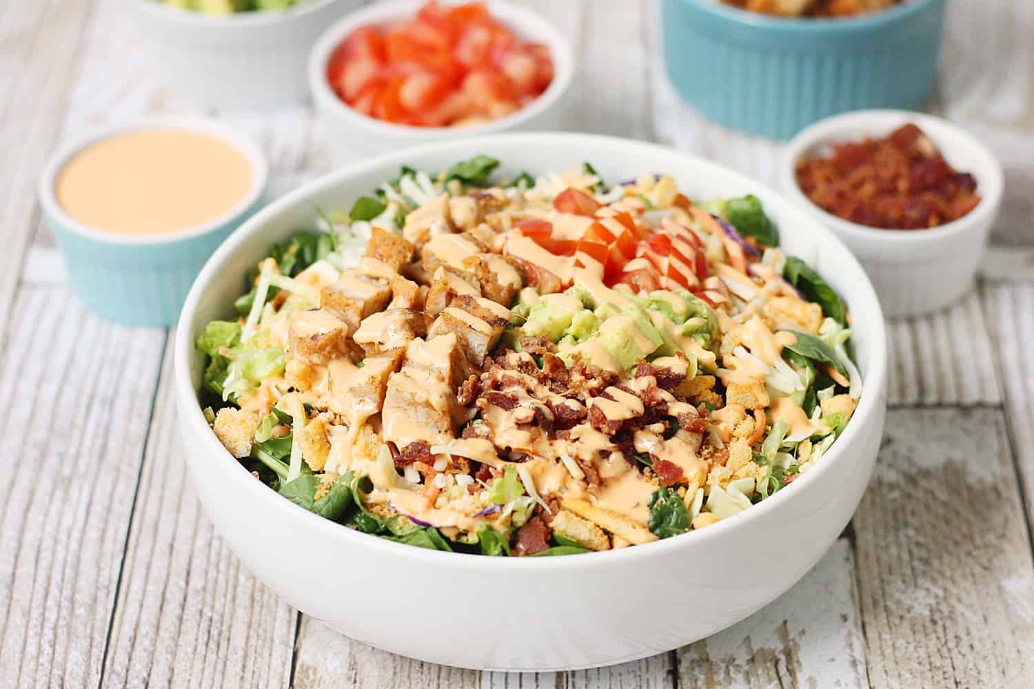 5-Minute Southwest BLT Chicken Salad -- This 5-minute southwest BLT chicken salad makes for an easy weeknight recipe. It's perfect for warm summer days or any time you need to quickly throw together a yummy, family-friendly meal! #salad #chicken #easyrecipe #sidedish #maindish #chickensalad #blt #halfscratched