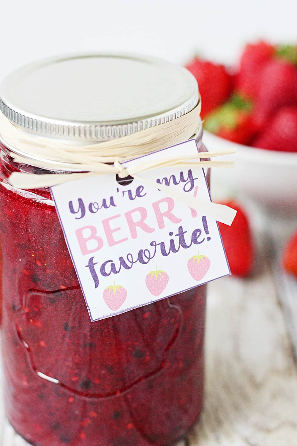 Mixed Berry Freezer Jam in a jar close-up.