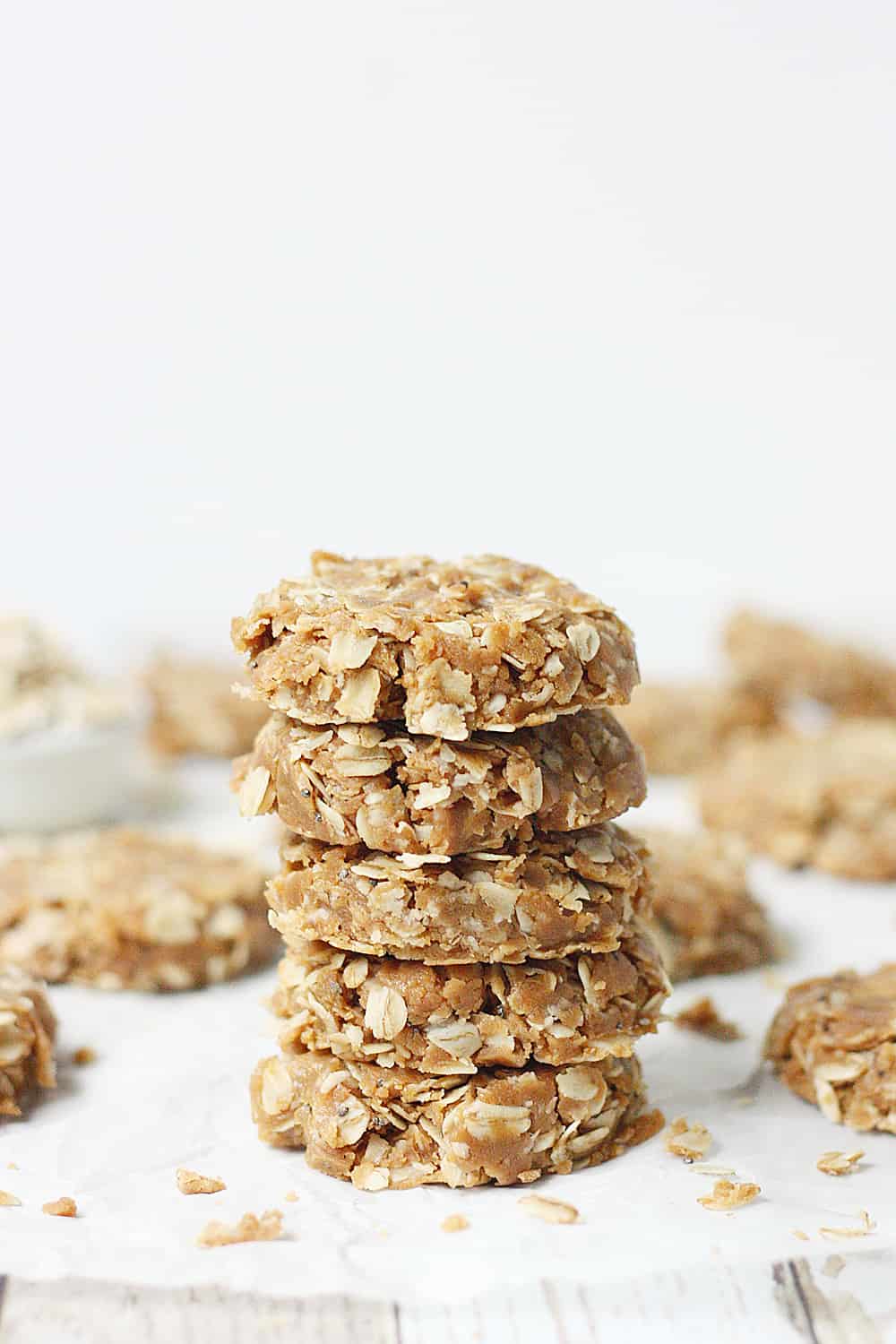 Healthy No-Bake Peanut Butter Oatmeal Protein Cookies --These healthy no bake cookies aren't packed with ingredients (only peanut butter, maple syrup, oatmeal, and vanilla protein) but they are packed with yummy flavor! They are as irresistible as they are easy! #halfscratched #nobake #cookies #healthyrecipe #oatmealcookies #peanutbutter #proteincookies #proteinbites #healthy #snack
