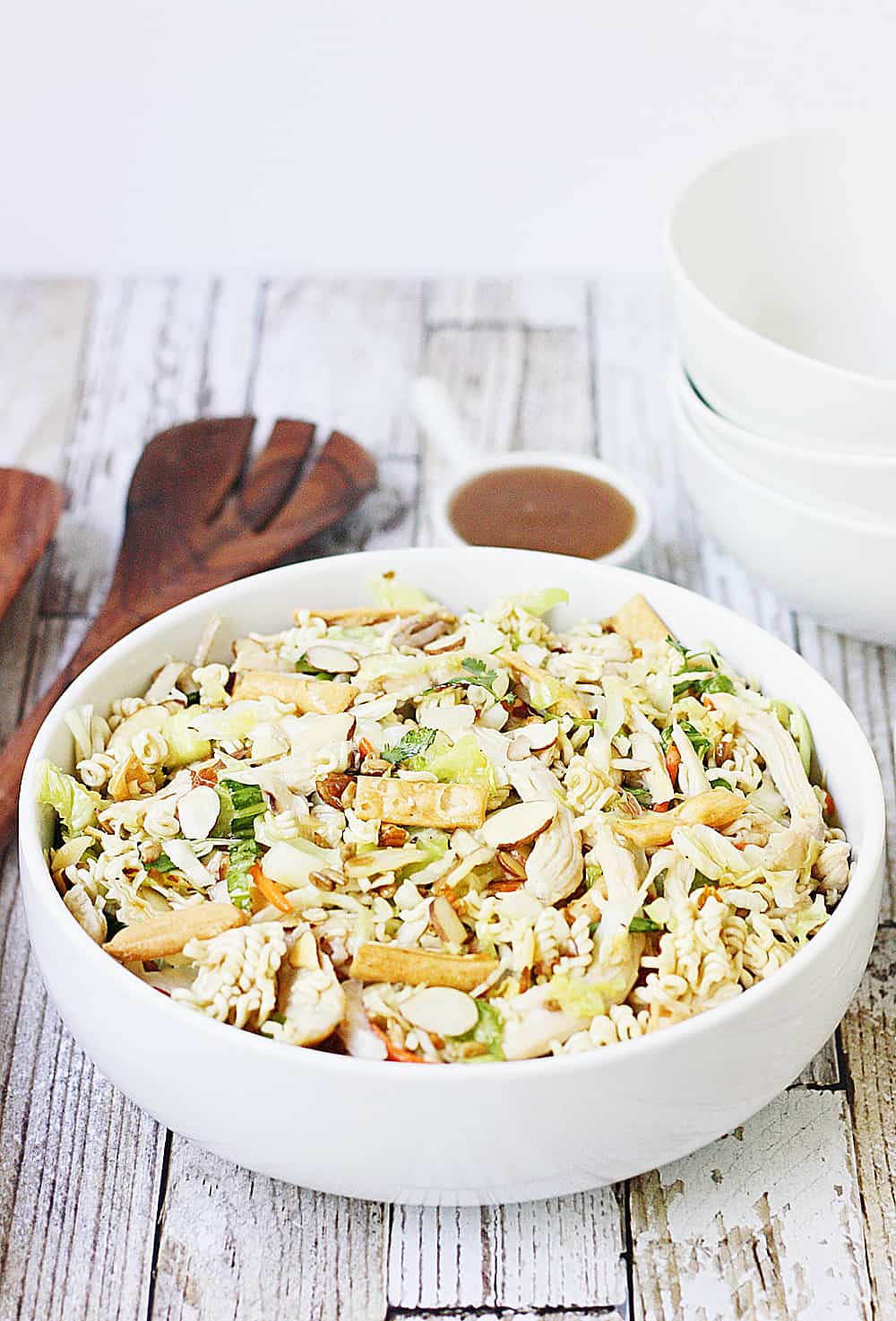 Easy Asian Ramen Salad -- My family LOVES this Asian ramen salad! An Asian salad kit + rotisserie chicken + a few simple ingredients equals the easiest Asian ramen noodle salad ever!