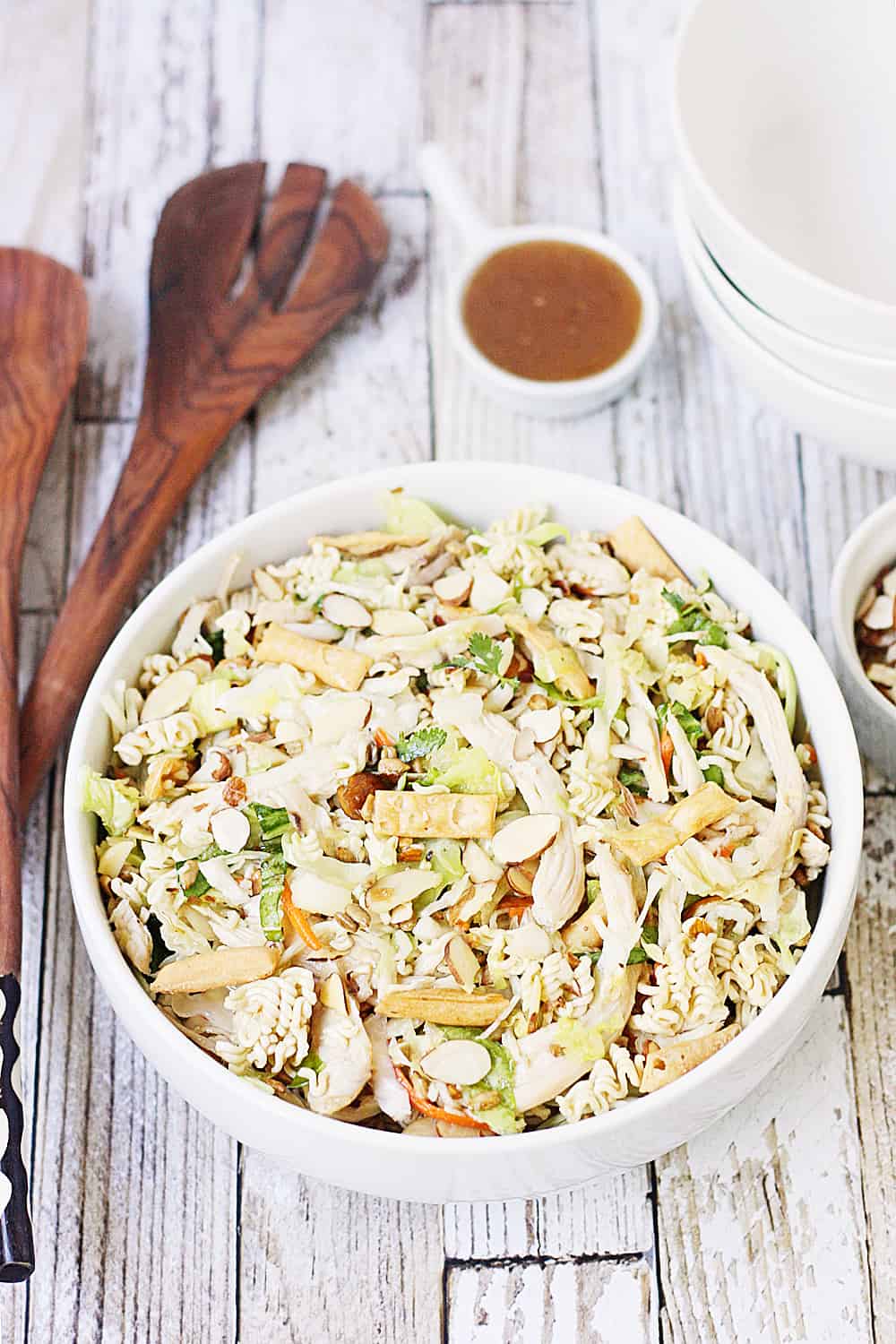 Easy Asian Ramen Salad -- My family LOVES this Asian ramen salad! An Asian salad kit + rotisserie chicken + a few simple ingredients equals the easiest Asian ramen noodle salad ever!