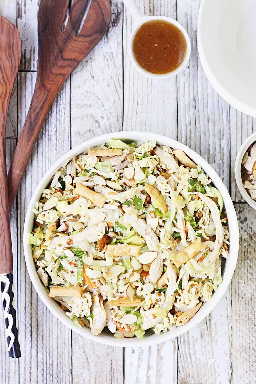 Easy Asian Ramen Salad -- My family LOVES this Asian ramen salad! An Asian salad kit + rotisserie chicken + a few simple ingredients equals the easiest Asian ramen noodle salad ever!