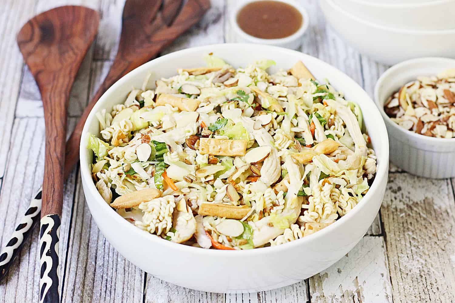 Easy Asian Ramen Salad -- My family LOVES this Asian ramen salad! An Asian salad kit + rotisserie chicken + a few simple ingredients equals the easiest Asian ramen noodle salad ever!