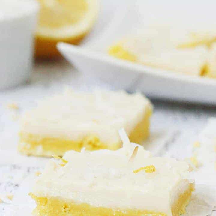 Easy Lemon Bars with a Cake Mix -- Summer celebrations aren't complete without these easy lemon bars! Lemon cake mix, lemon zest, and coconut make this the best lemon bar recipe!