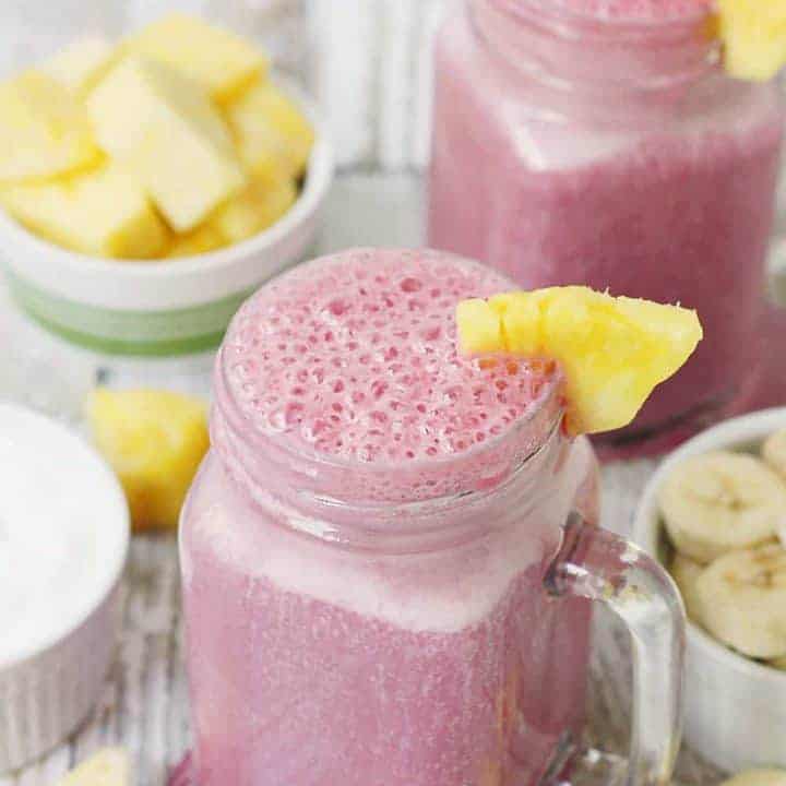 4-Ingredient Pineapple Cranberry Smoothie -- Cranberry lovers will enjoy this 4-ingredient pineapple cranberry smoothie! It features all-natural cranberry juice, frozen pineapple and banana, and Greek yogurt for a tart, good-for-you smoothie! #smoothie #cranberry #whatsyourjuicemadeof @walmart #KnudsenFarmToBottle #pineapple #drink #healthyrecipe #ad