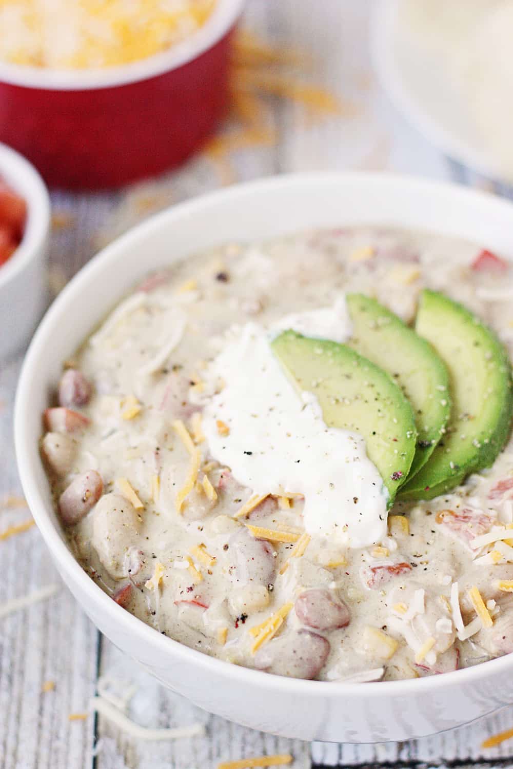 Easy Vegetarian White Bean Chili -- Busy weeknights call for yummy recipes like this easy vegetarian white bean chili. Bell pepper, onion, and corn make it extra hearty!