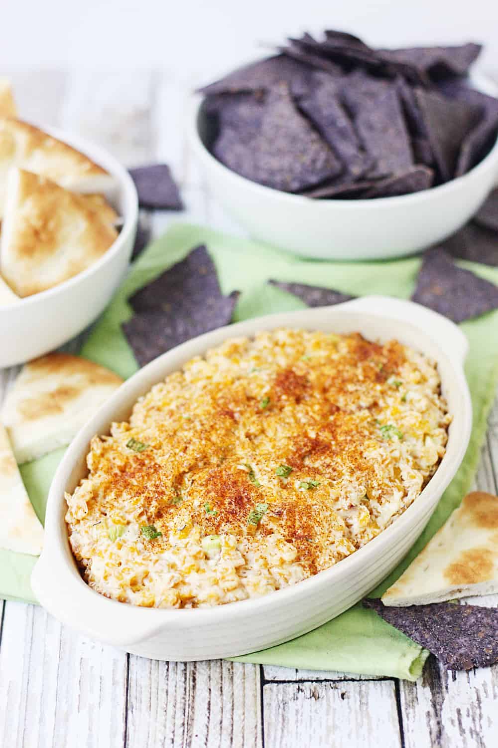 Easy Hot Corn Dip -- This hot corn dip recipe is rich, creamy, and full of flavor. It also comes together super quickly and is super delicious served with favorite crackers! #corndip #appetizer #hotappetizer #appetizerrecipe #halfscratched #corn #cornrecipe #holidayrecipe #cooking #recipe #easyrecipe
