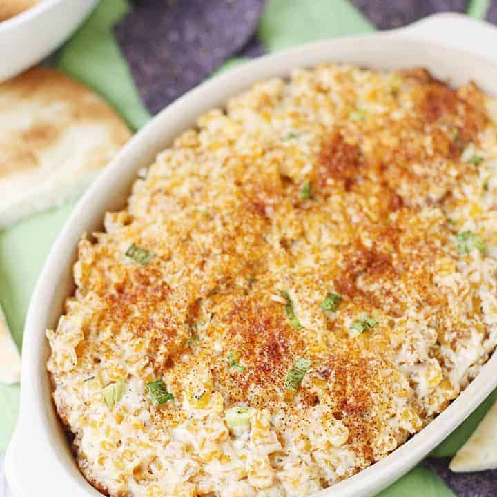 Easy Hot Corn Dip -- This hot corn dip recipe is rich, creamy, and full of flavor. It also comes together super quickly and is super delicious served with favorite crackers! #corndip #appetizer #hotappetizer #appetizerrecipe #halfscratched #corn #cornrecipe #holidayrecipe #cooking #recipe #easyrecipe