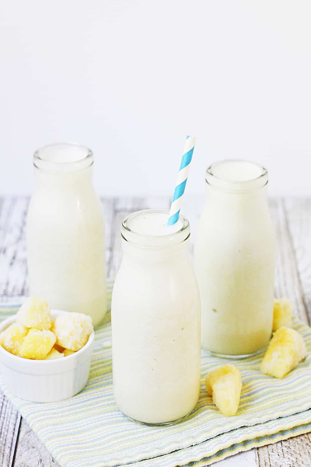 Pina Colada Protein Smoothie - This pina colada protein smoothie is an easy, healthy, delicious, protein-packed way to enjoy your favorite tropical beverage! #halfscratched #pinacolada #smoothie #proteinshake #proteinsmoothie #smoothierecipe #drinkrecipe #drink #healthyrecipe #healthy #pinacoladashake