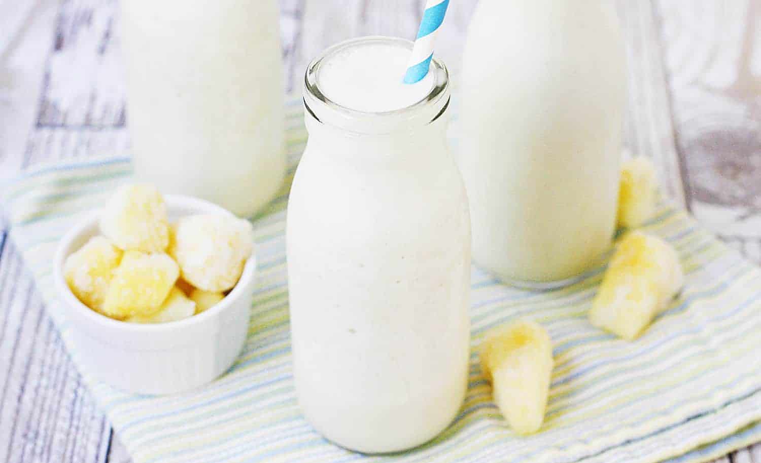 Pina Colada Protein Smoothie - This pina colada protein smoothie is an easy, healthy, delicious, protein-packed way to enjoy your favorite tropical beverage! #halfscratched #pinacolada #smoothie #proteinshake #proteinsmoothie #smoothierecipe #drinkrecipe #drink #healthyrecipe #healthy #pinacoladashake