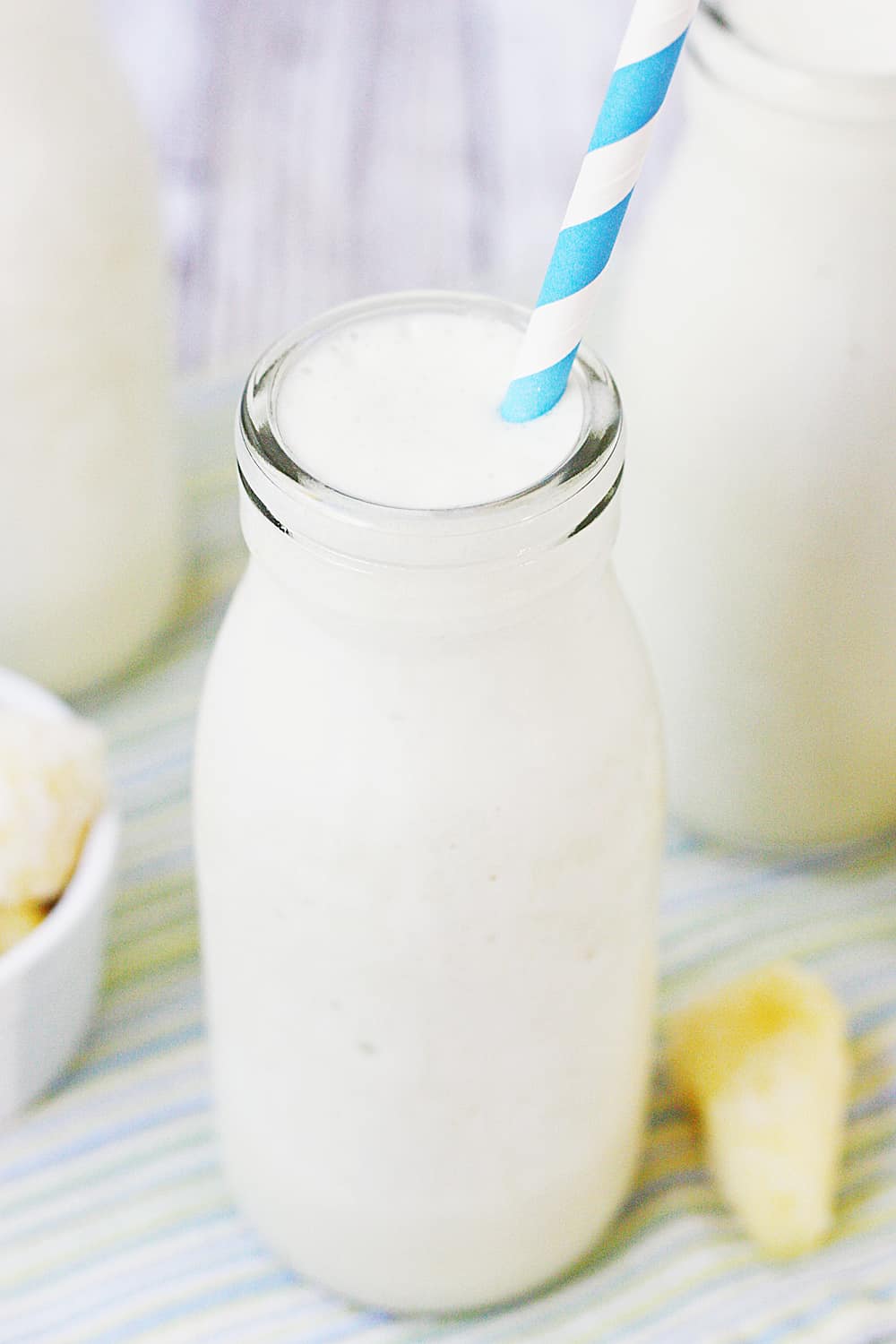 Pina Colada Protein Smoothie - This pina colada protein smoothie is an easy, healthy, delicious, protein-packed way to enjoy your favorite tropical beverage! #halfscratched #pinacolada #smoothie #proteinshake #proteinsmoothie #smoothierecipe #drinkrecipe #drink #healthyrecipe #healthy #pinacoladashake