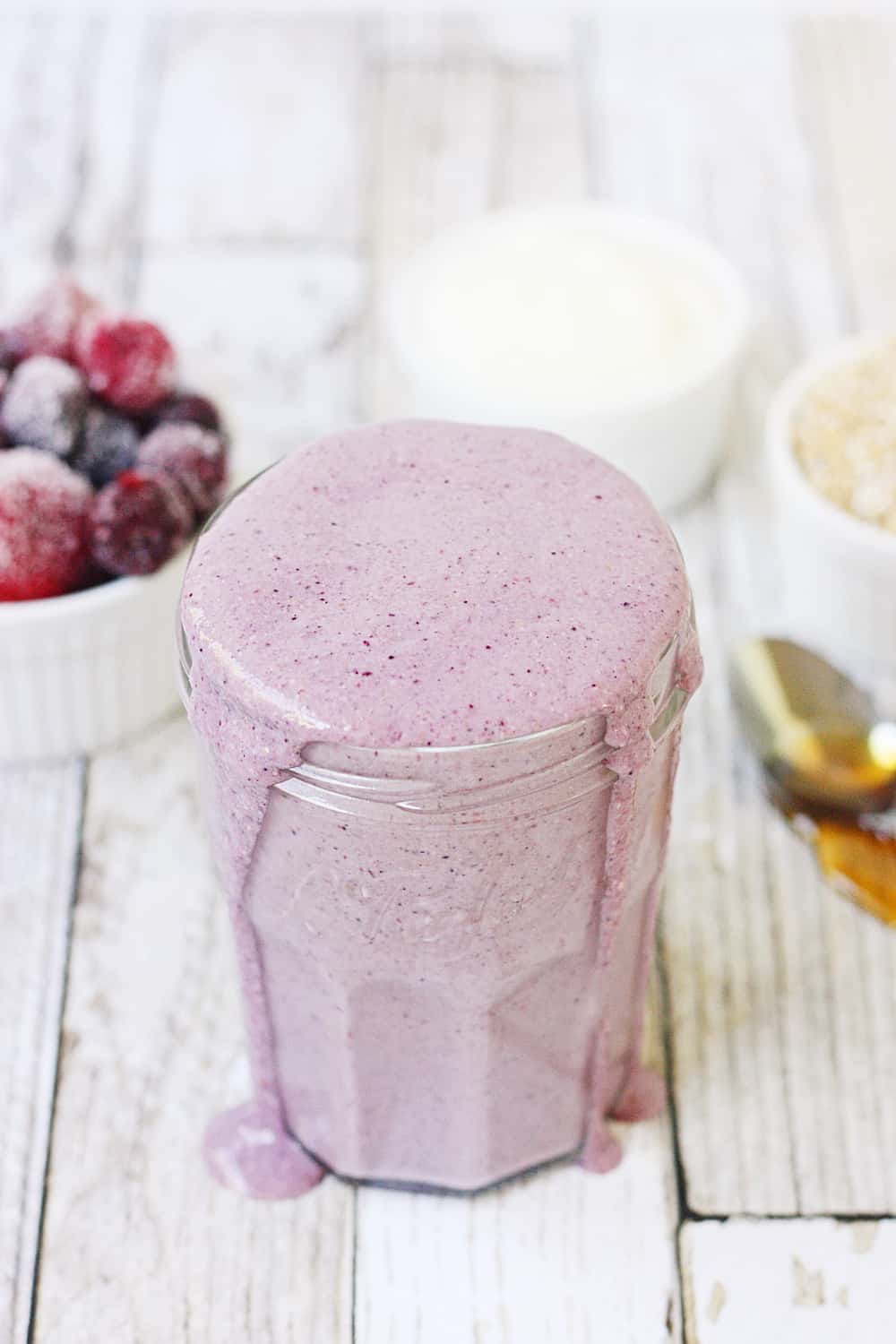 Mixed Berry Protein Smoothie - This mixed berry protein smoothie combines frozen berries, Greek yogurt, steel-cut oats, and protein powder for a healthy, delicious breakfast shake to start your day! #smoothie #proteinshake #proteinsmoothie #shake #breakfast #recipe #berry #halfscratched #ad #easyrecipe