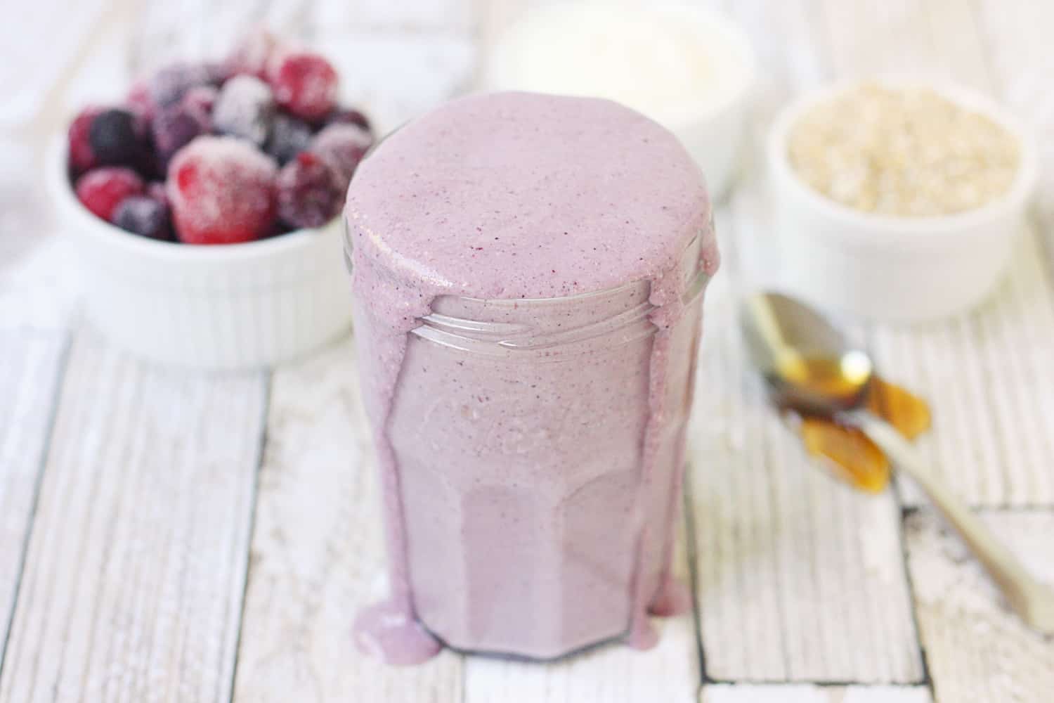 Mixed Berry Protein Smoothie - This mixed berry protein smoothie combines frozen berries, Greek yogurt, steel-cut oats, and protein powder for a healthy, delicious breakfast shake to start your day! #smoothie #proteinshake #proteinsmoothie #shake #breakfast #recipe #berry #halfscratched #ad #easyrecipe