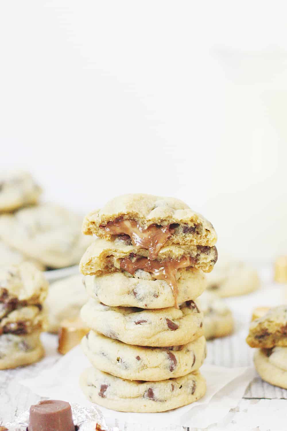 Chocolate Chip Rolo Cookies - Chocolate chip Rolo cookies feature a soft, chewy chocolate chip cookie filled with an ooey, gooey Rolo center. These Rolo cookies will make you rethink the classic recipe! #cookies #halfscratched #rolo #rolocookies #dessert #easyrecipe #cookierecipe #chocolate #cookiedough #baking