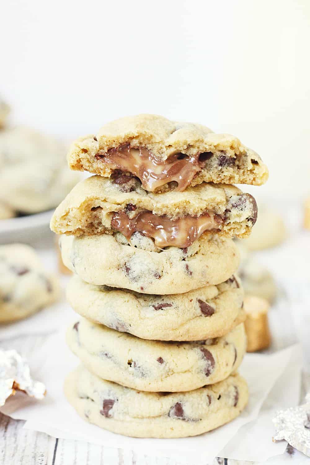 Chocolate Chip Rolo Cookies - Chocolate chip Rolo cookies feature a soft, chewy chocolate chip cookie filled with an ooey, gooey Rolo center. These Rolo cookies will make you rethink the classic recipe! #cookies #halfscratched #rolo #rolocookies #dessert #easyrecipe #cookierecipe #chocolate #cookiedough #baking