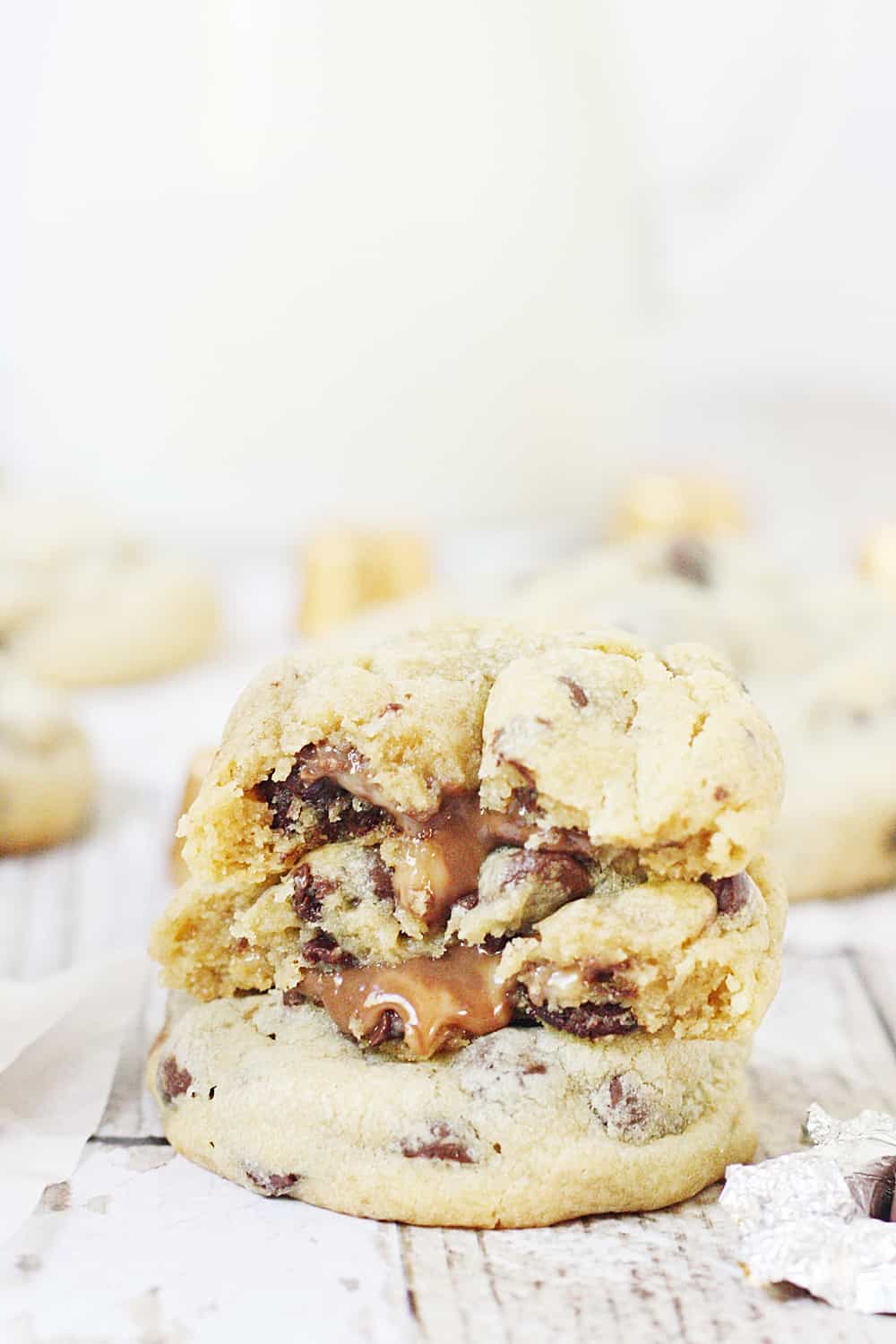 Chocolate Chip Rolo Cookies - Chocolate chip Rolo cookies feature a soft, chewy chocolate chip cookie filled with an ooey, gooey Rolo center. These Rolo cookies will make you rethink the classic recipe! #cookies #halfscratched #rolo #rolocookies #dessert #easyrecipe #cookierecipe #chocolate #cookiedough #baking