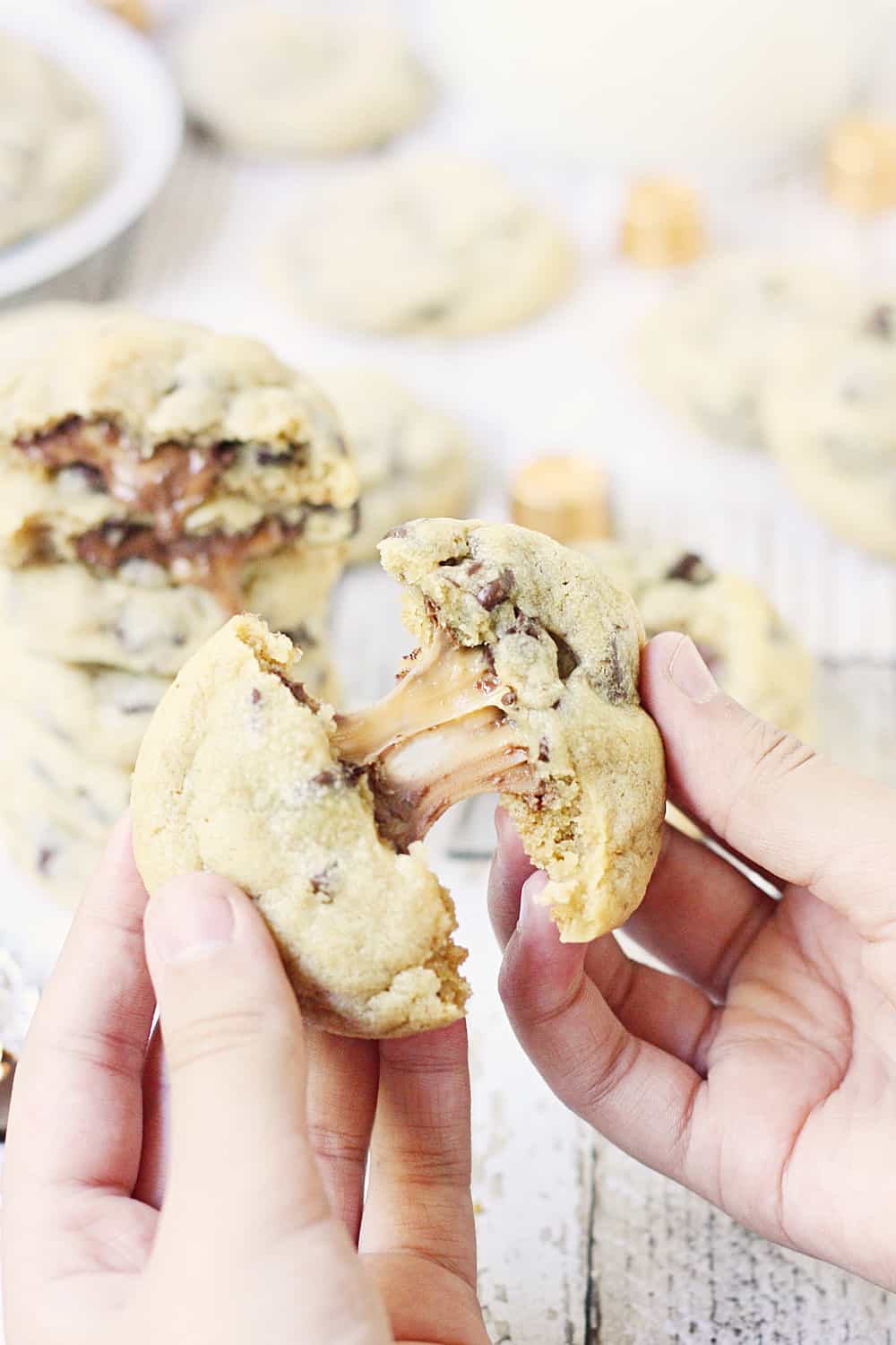 Chocolate Chip Rolo Cookies - Chocolate chip Rolo cookies feature a soft, chewy chocolate chip cookie filled with an ooey, gooey Rolo center. These Rolo cookies will make you rethink the classic recipe! #cookies #halfscratched #rolo #rolocookies #dessert #easyrecipe #cookierecipe #chocolate #cookiedough #baking