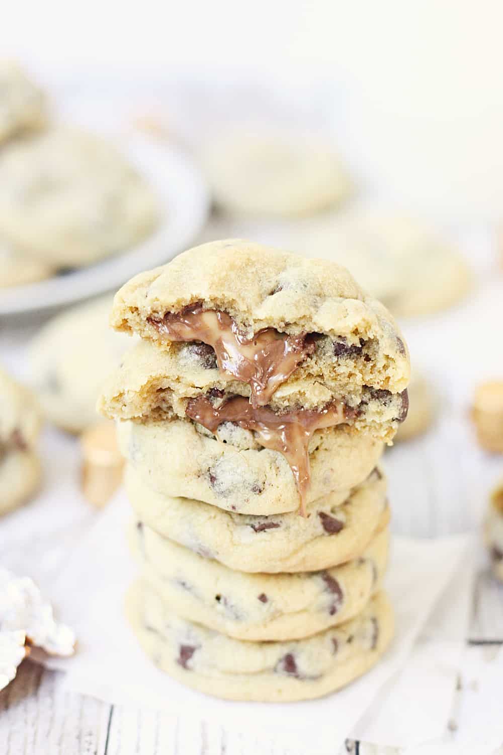 Chocolate Chip Rolo Cookies - Chocolate chip Rolo cookies feature a soft, chewy chocolate chip cookie filled with an ooey, gooey Rolo center. These Rolo cookies will make you rethink the classic recipe! #cookies #halfscratched #rolo #rolocookies #dessert #easyrecipe #cookierecipe #chocolate #cookiedough #baking