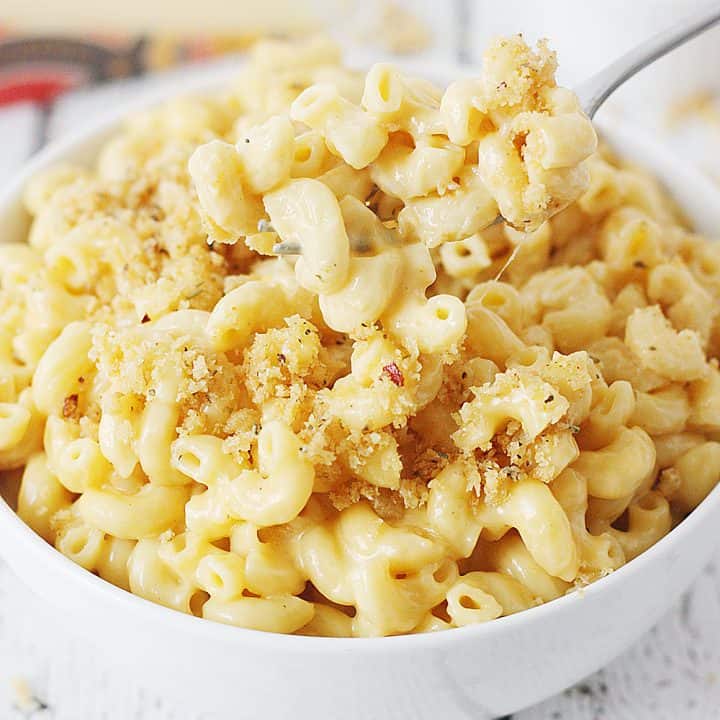 Easy Instant Pot Mac and Cheese - This easy Instant Pot mac and cheese is the creamiest, cheesiest, downright most delicious Instant Pot mac and cheese recipe ever! #macandcheese #instantpot #pressurecooker #macaroniandcheese #pasta #easyrecipe #recipe #cooking #halfscratched #ad #jarlsberg #cheese