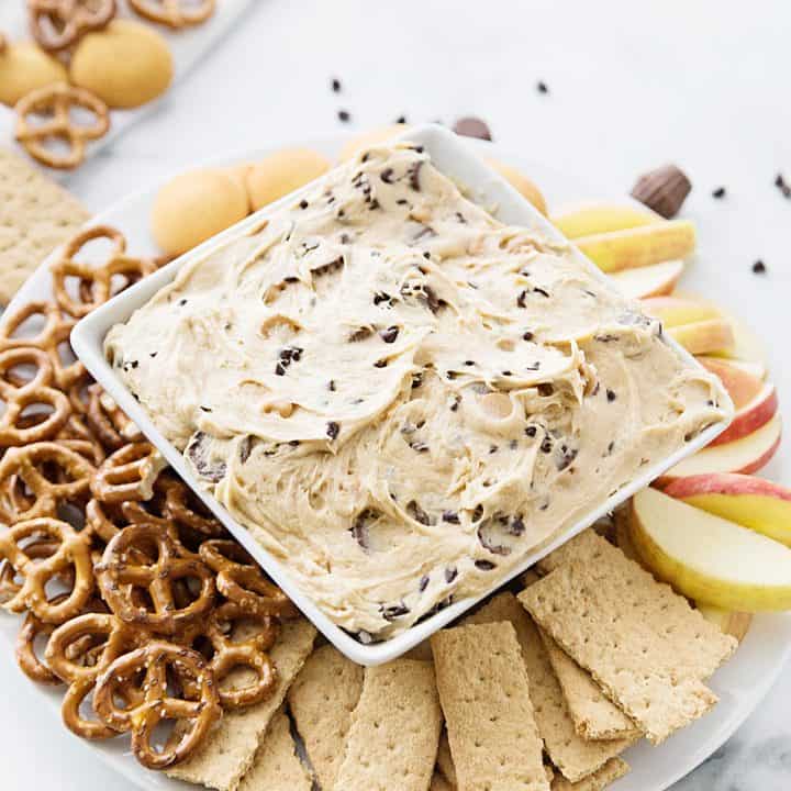 Peanut Butter Cookie Dough Dip - Love it when a dessert doubles as an appetizer! Peanut butter cookie dough dip is a delish flavor combo and will quickly become everyone's favorite! #halfscratched #appetizer #dessert #easyrecipe #cookiedough #cookiedoughdip #peanutbutter #baking #sweet