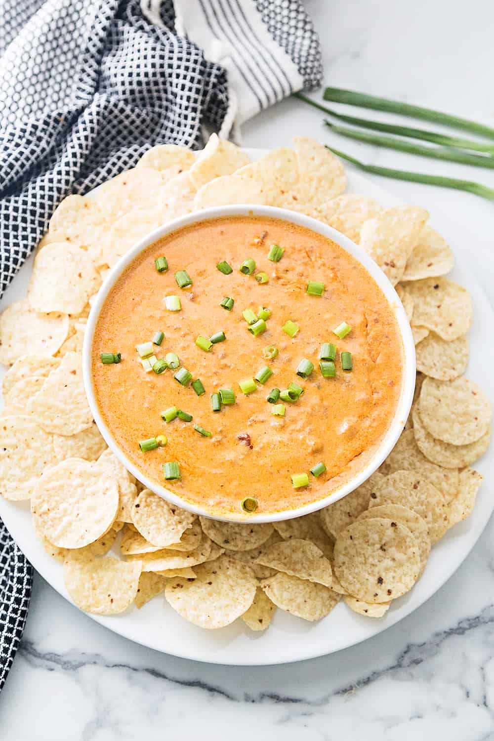 Ready for an extra cheesy, slightly spicy appetizer family and friends will devour in record time? Whip up some easy chorizo cheese dip. Your guests--and your taste buds--will thank you. #halfscratched #chorizo #chorizodip #appetizer #cheese #easyrecipe #baking #cooking #holidayrecipe #gamedayrecipe