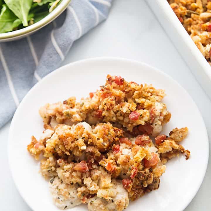 Easy Bruschetta Chicken Bake - Crazy weeknights call for quick dinners like this bruschetta chicken bake. Ready in about 30 minutes, this flavorful dish will become a family favorite! #bruschetta #chicken #chickenrecipe #recipe #halfscratched #easyrecipe #maindish #baking #cooking #bruschettachicken