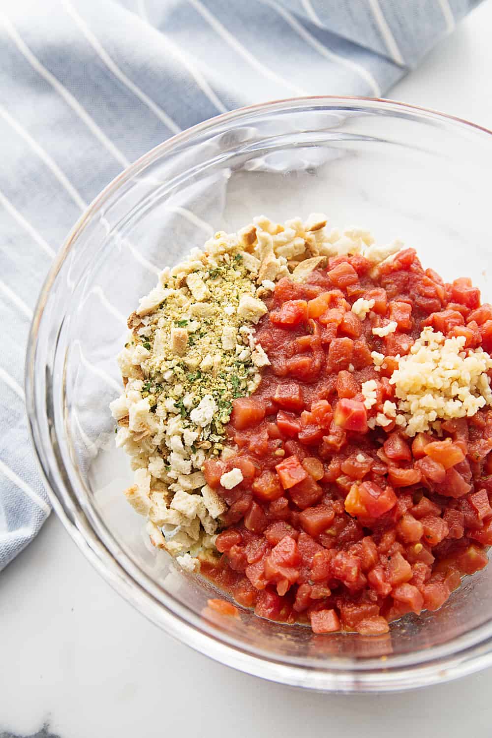 Easy Bruschetta Chicken Bake - Crazy weeknights call for quick dinners like this bruschetta chicken bake. Ready in about 30 minutes, this flavorful dish will become a family favorite! #bruschetta #chicken #chickenrecipe #recipe #halfscratched #easyrecipe #maindish #baking #cooking #bruschettachicken