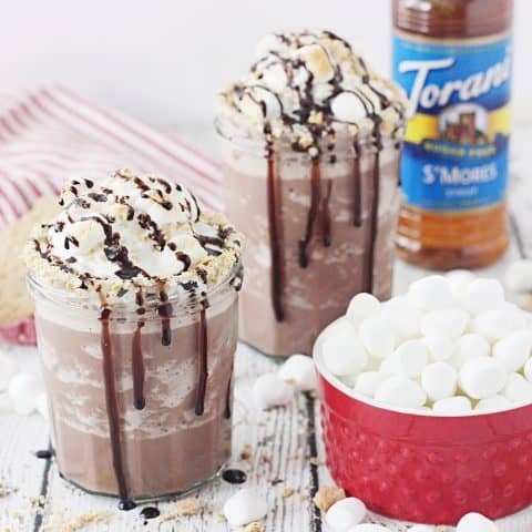 Guilt-Free S'mores Frozen Hot Chocolate - Hot drinks during winter are nice, but sometimes all you want is an icy glass of guilt-free s'mores frozen hot chocolate! #hotchocolate #frozenhotchocolate #torani #aguiltfreeholiday #ad #halfscratched #smores #dessert #drinkrecipe #holidayrecipe