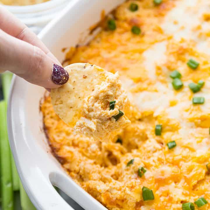 Best Buffalo Chicken Dip - Cheesy, creamy, and all kinds of spicy! There's a reason this buffalo chicken dip is affectionately known as crack chicken dip. #appetizer #buffalo #buffalodip #buffalochicken #recipe #halfscratched #easyrecipe