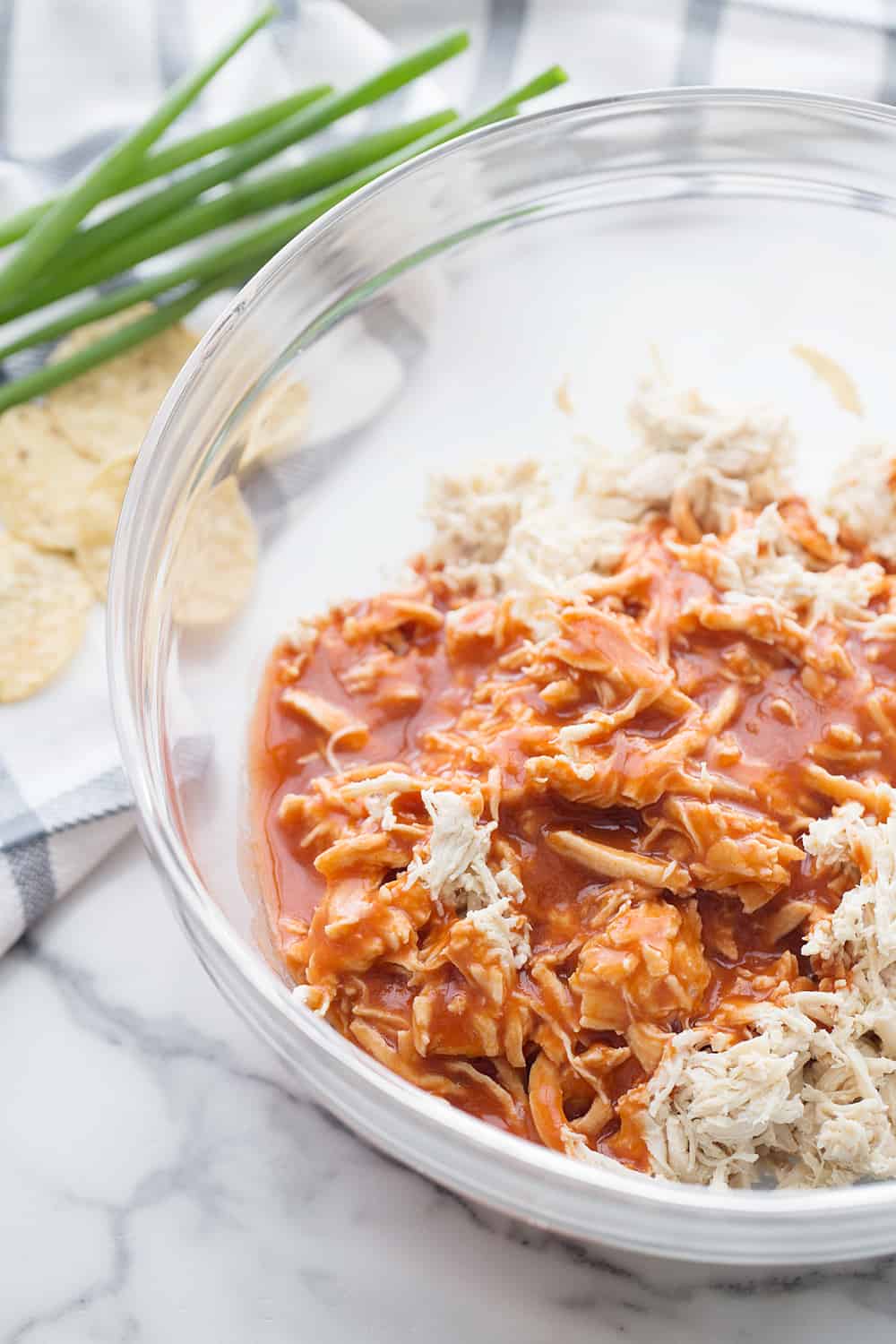 Best Buffalo Chicken Dip ingredients in a bowl.