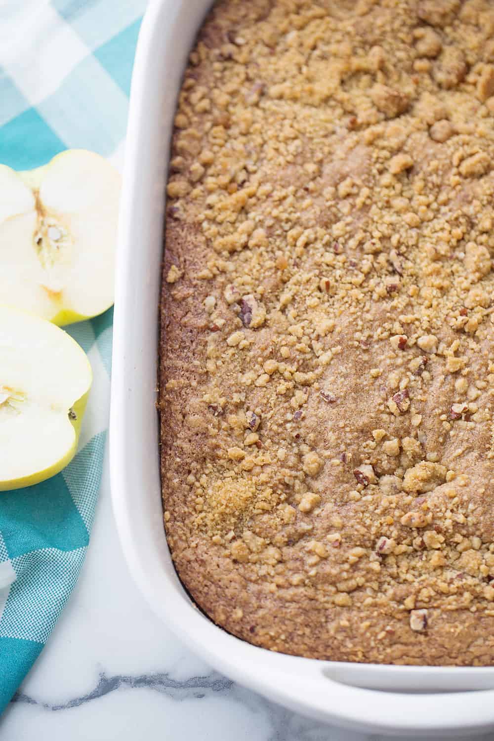 Applesauce Crunch Cake - There's applesauce cake and then there's applesauce CRUNCH cake. Why go for ordinary when you can opt for extraordinary with a crunchy topping? #cake #dessert #applesaucecake #easyrecipe #baking #sweets #easycake #cakerecipe #HalfScratched