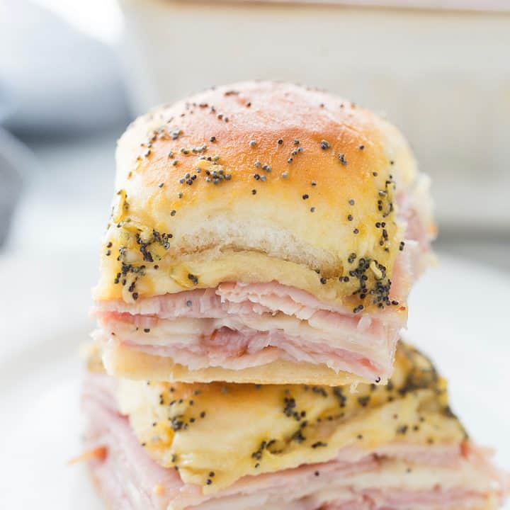 Hawaiian Ham & Cheese Sliders - Need a tasty way to use leftover ham or a recipe that'll feed a crowd? Look no further than Hawaiian ham and cheese sliders! #sliders #leftoverham #easyrecipe #hamandcheesesliders #maindish #baking #partyrecipe #holidayrecipe #halfscratched