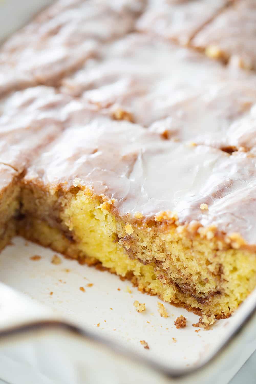 Honey Bun Cake sliced in an oven pan.