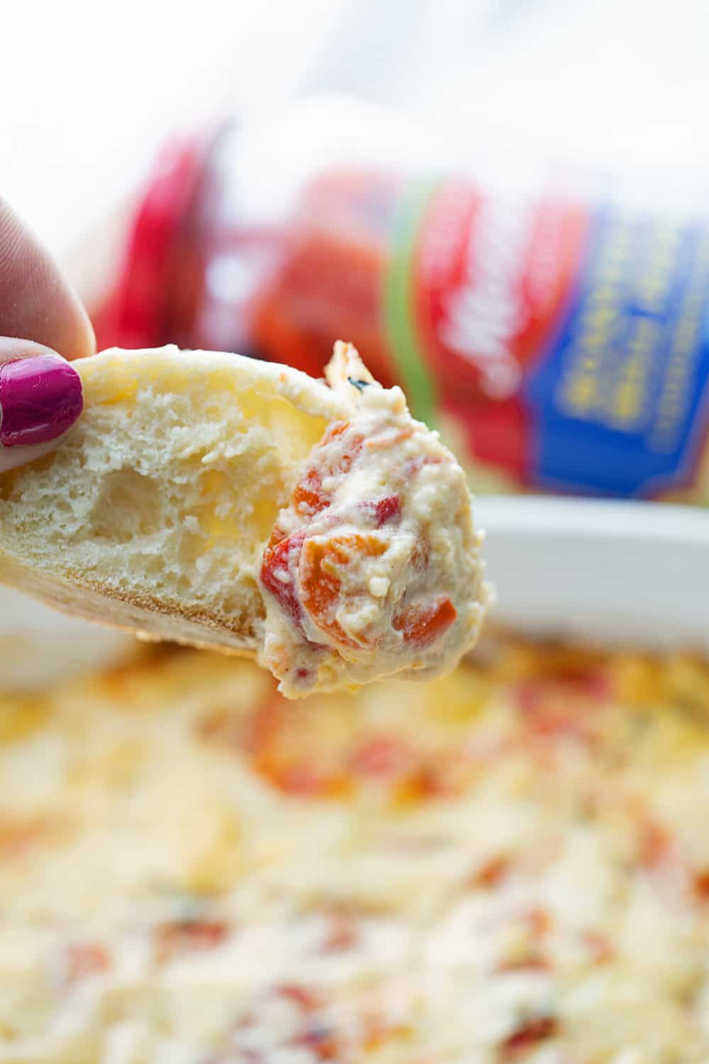 Hot Roasted Red Pepper Dip - Planning a summer staycation? #ad Make sure to add some hot roasted red pepper dip to the schedule. In fact, it's so good, you'll want to list it twice! The rich, smoky flavor of @Mezzetta roasted red peppers take this creamy, cheesy, flavorful dip to an entirely new level—a totally tasty, gotta-have-it level! #Mezzetta #halfscratched #hotdip #hotappetizer #appetizer #baking #cooking #vegetarian