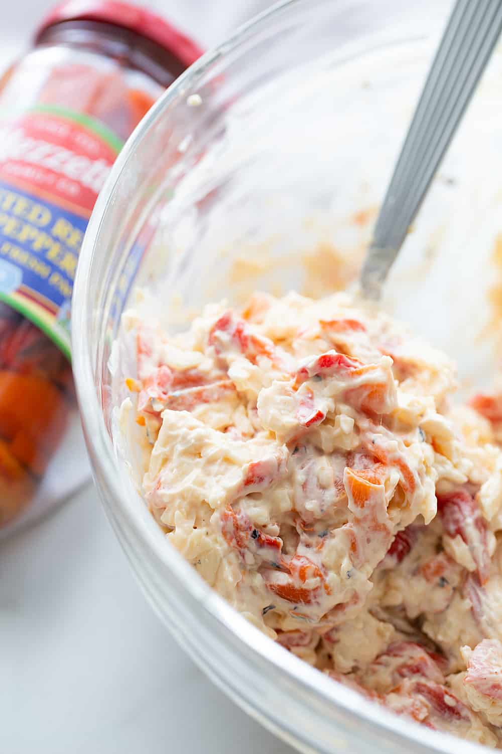 Hot Roasted Red Pepper Dip - Planning a summer staycation? #ad Make sure to add some hot roasted red pepper dip to the schedule. In fact, it's so good, you'll want to list it twice! The rich, smoky flavor of @Mezzetta roasted red peppers take this creamy, cheesy, flavorful dip to an entirely new level—a totally tasty, gotta-have-it level! #Mezzetta #halfscratched #hotdip #hotappetizer #appetizer #baking #cooking #vegetarian