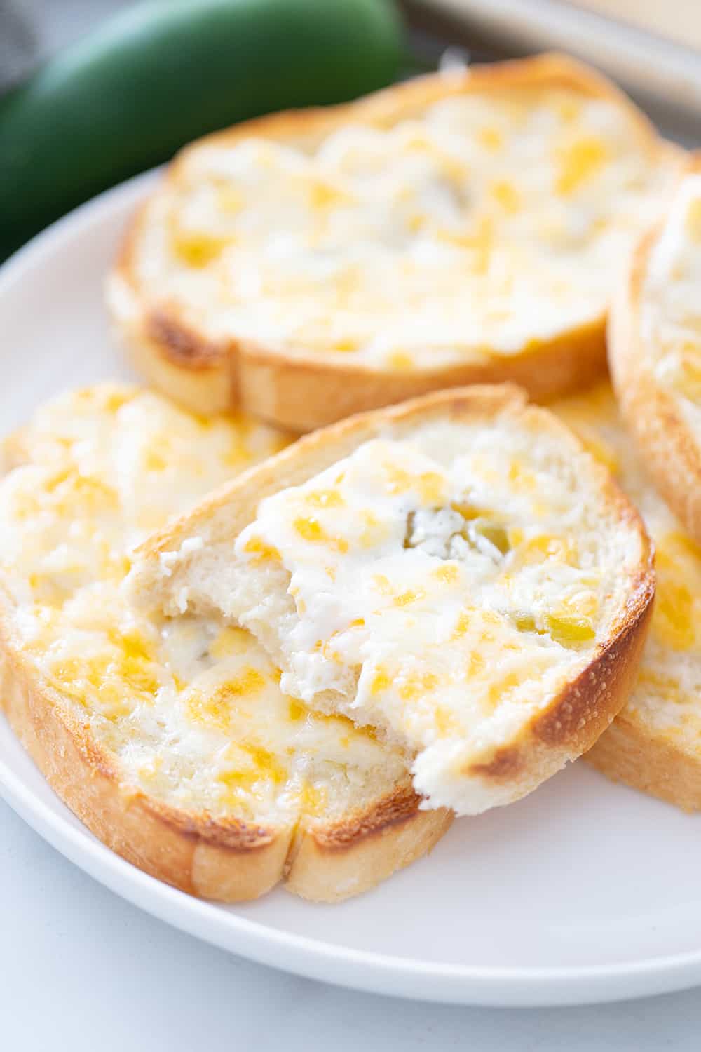 Creamy, cheesy spread with a bit of kick? Check! This zesty cheese spread is a must-have appetizer whether you're having a party of 1 or 100. | #halfscratched #appetizer #cheese #easyrecipe #hotappetizer #baking #cheesespread #easyappetizer