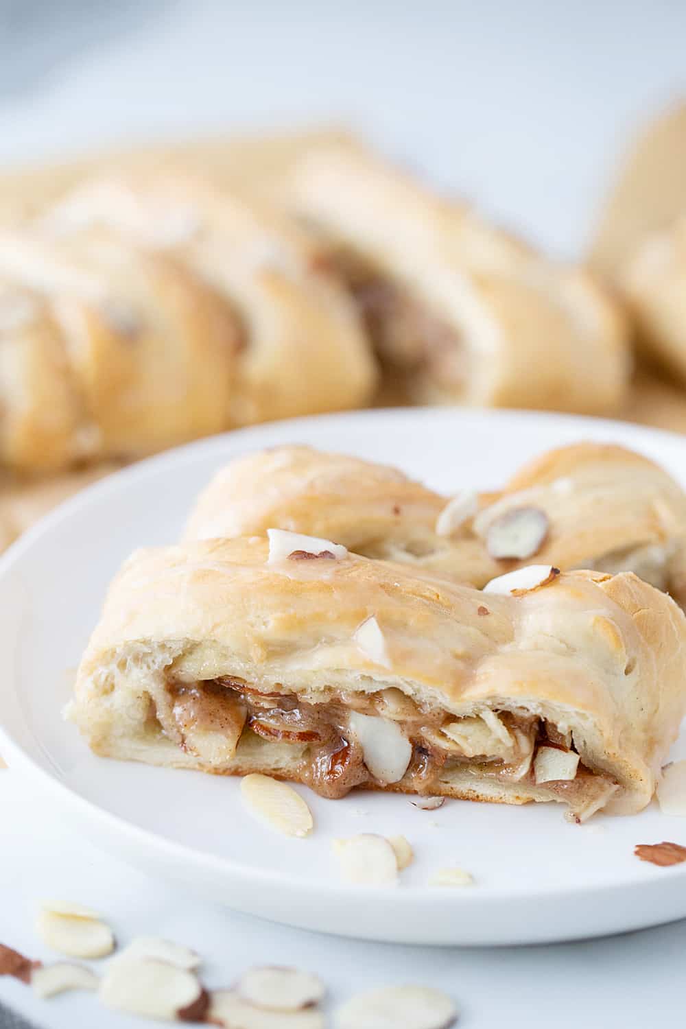 Easy Almond Braid - This easy almond braid is simple *and* totally scrumptious. Good luck not eating the entire beautifully braided dessert in one sitting! #halfscratched #dessert #brunch #almond #almonddessert #baking #almondbraid #braideddessert #recipe #dessertrecipe